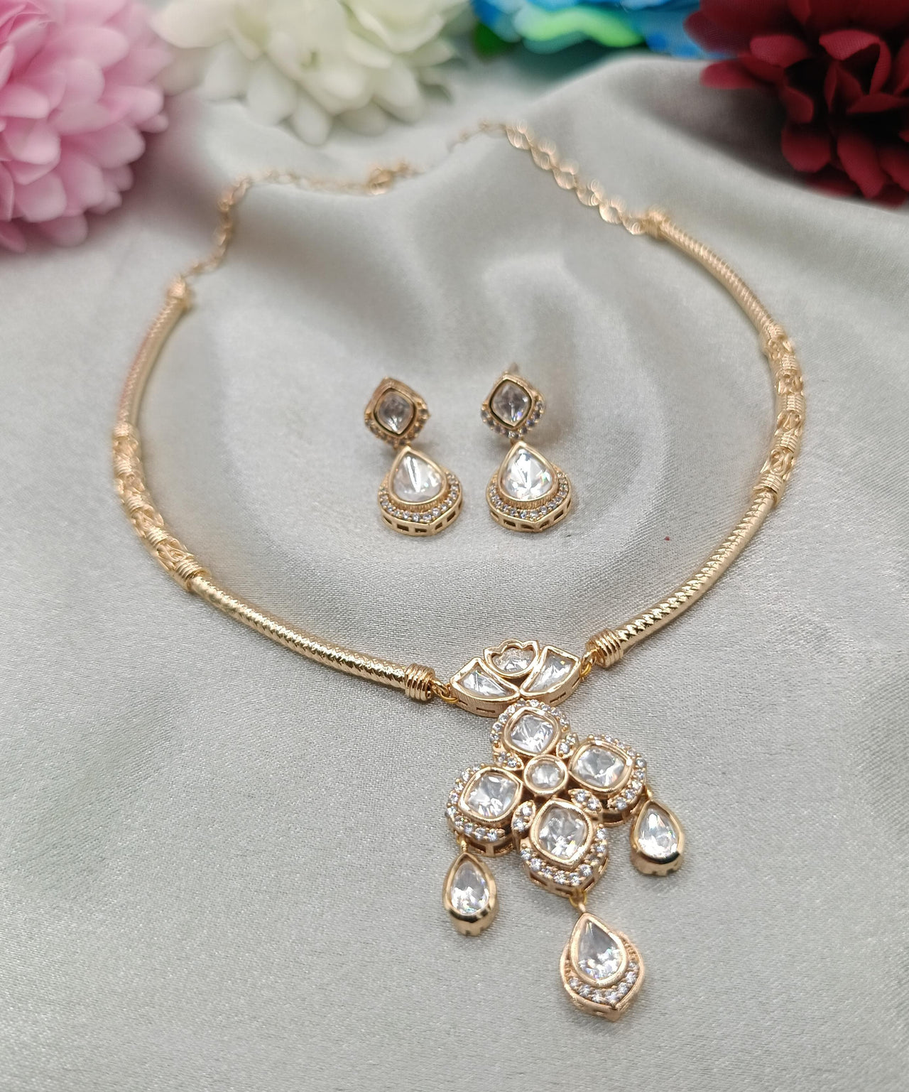 Ruchika Brass Gold Plated Kundan Moissanite Hasli Necklace with Earring