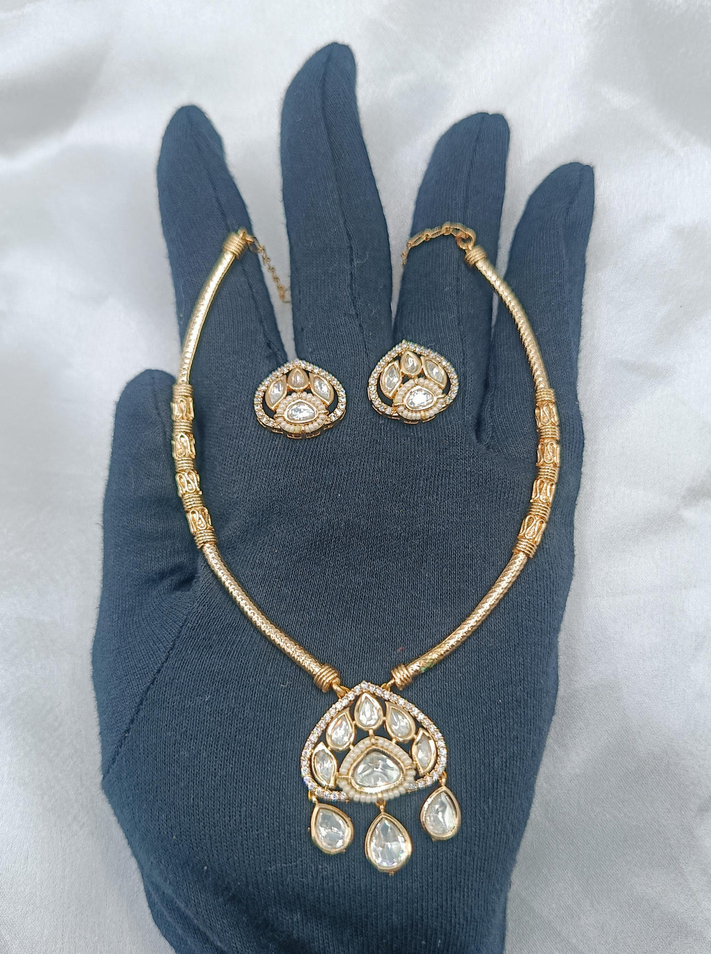 Avani Brass Gold Plated Kundan Moissanite Hasli Necklace with Earring