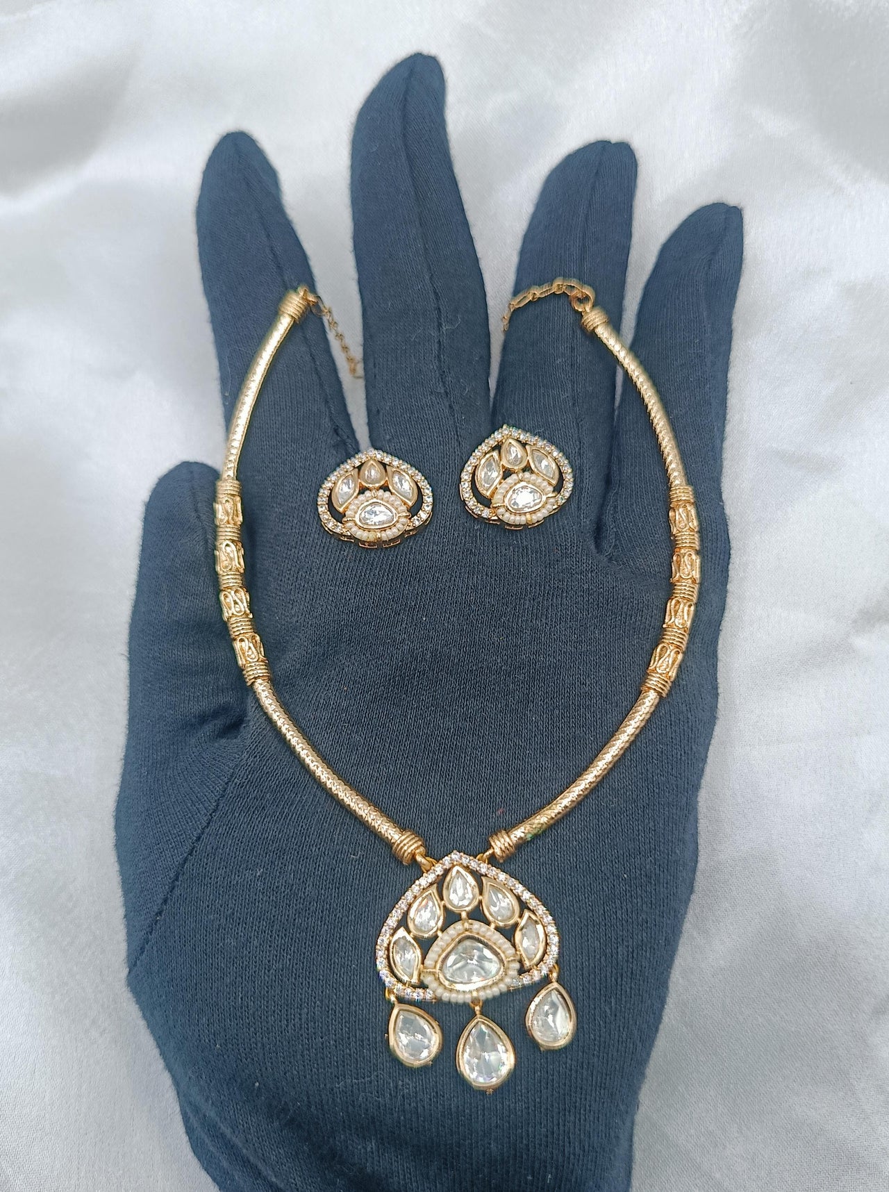 Avani Brass Gold Plated Kundan Moissanite Hasli Necklace with Earring