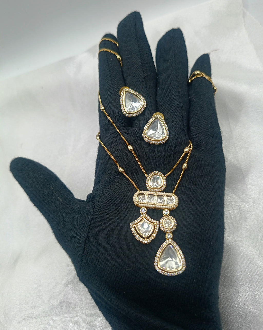 Monalisa Tringle Brass Gold Plated Double Chain Kundan Moissanite Chain Pendant Set