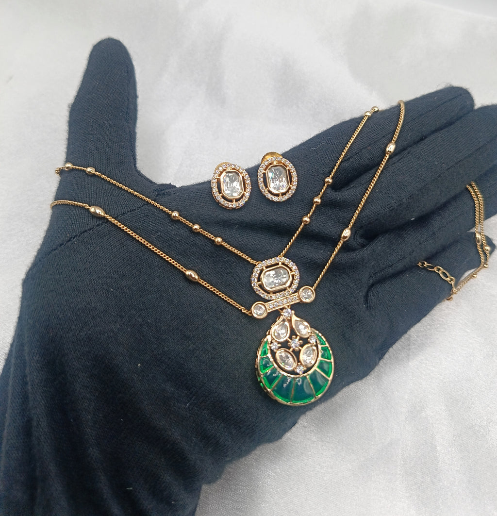 Yuktika Emerald Gold Plated Double Chain Kundan Moissanite Pendant Set